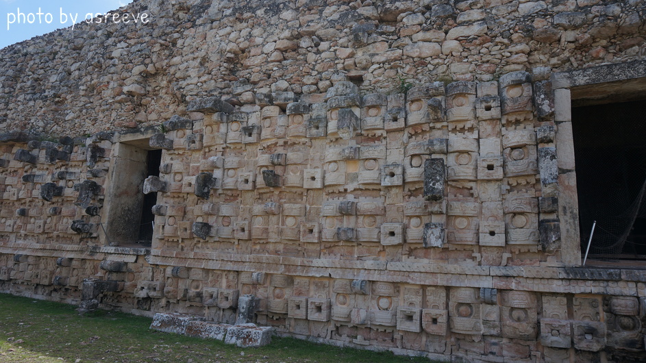 Carvings of the Mayan Rain God embellish the temple