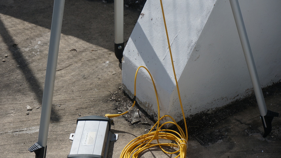 The top of the nail in the concrete was surveyed in as a benchmark.