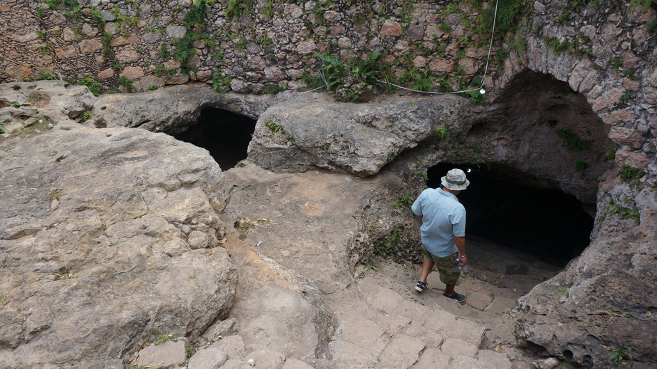Ismael descends into the cave/cenote