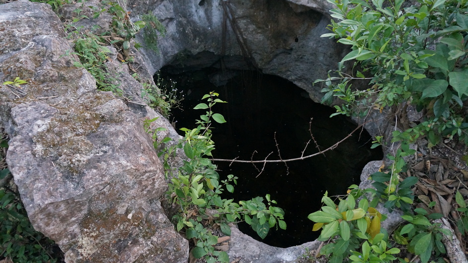 Opening over pool in cavern
